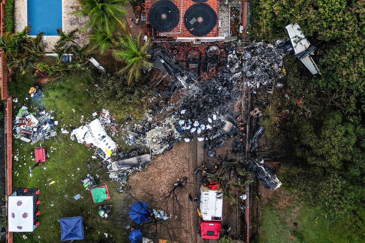 This photo shows an aerial view of the wreckage of an airplane that crashed with 61 people on board in Vinhedo, Sao Paulo State, Brazil, on August 10, 2024. Photo by Nelson ALMEIDA / AFP