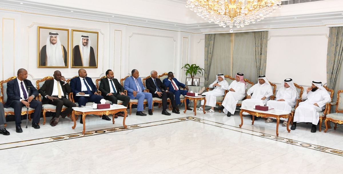 Undersecretary of the Sudanese Ministry of Finance and Economic Planning, H E Dr Mohammed Bashar Adam and QC Board Member Mohamed bin Ahmed Al Obaidli with other officials during the meeting.