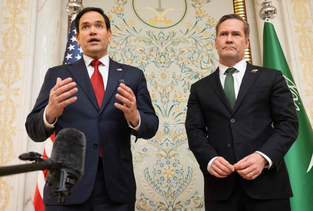 US Secretary of State Marco Rubio (L) and US National Security Advisor Mike Waltz (R) speak with the media following meetings with a Ukrainian delegation in Jeddah, Saudi Arabia, March 11, 2025. (Photo by Saul Loeb / POOL / AFP)