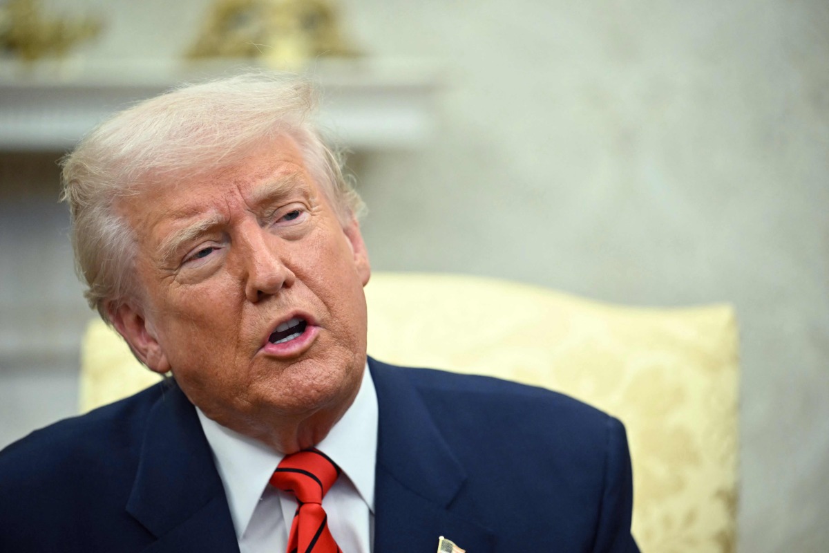 US President Donald Trump speaks to the press as he meets with NATO Secretary General Mark Rutte in the Oval Office of the White House in Washington, DC, on March 13, 2025. (Photo by Mandel NGAN / AFP)
