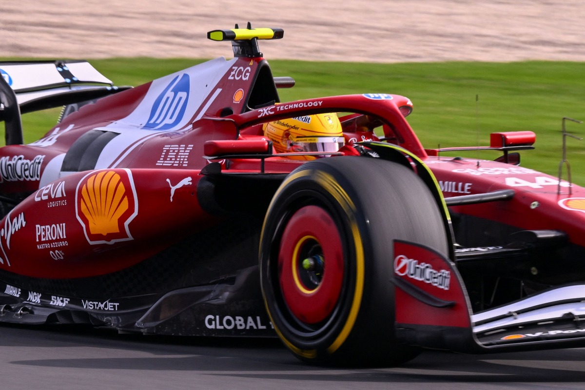 Ferrari's British driver Lewis Hamilton drives during the second practice session of the Formula One Australian Grand Prix at the Albert Park Circuit in Melbourne on March 14, 2025. (Photo by WILLIAM WEST / AFP)