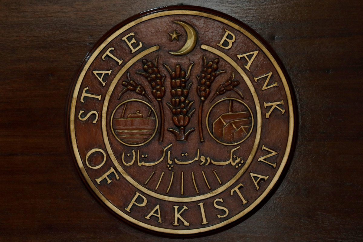 The logo of the State Bank of Pakistan (SBP) is pictured on a reception desk at the head office in Karachi, Pakistan July 16, 2019. REUTERS/Akhtar Soomro/File Photo

