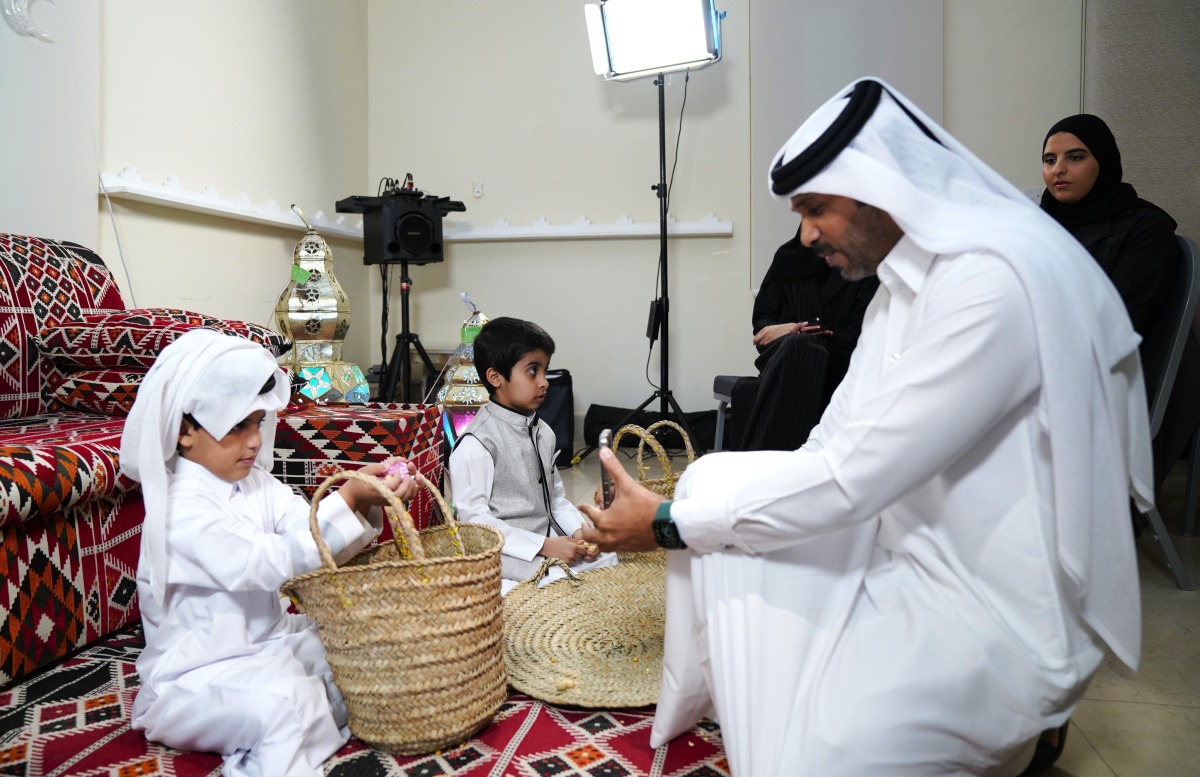 Children take part in the photography workshop. 