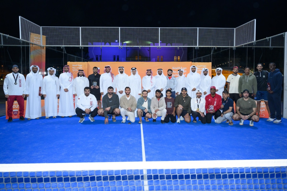 Qatar Olympic Committee (QOC) officials pose for a photograph with the winners of the QOC Ramadan Tournament 2025.