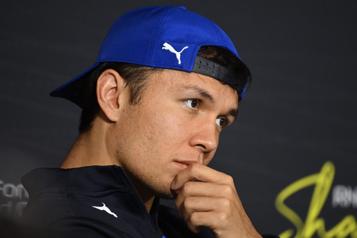 Williams' Thai driver Alexander Albon attends a press conference ahead of the Formula One Chinese Grand Prix at the Shanghai International Circuit in Shanghai on March 20, 2025. (Photo by Jade Gao / AFP)