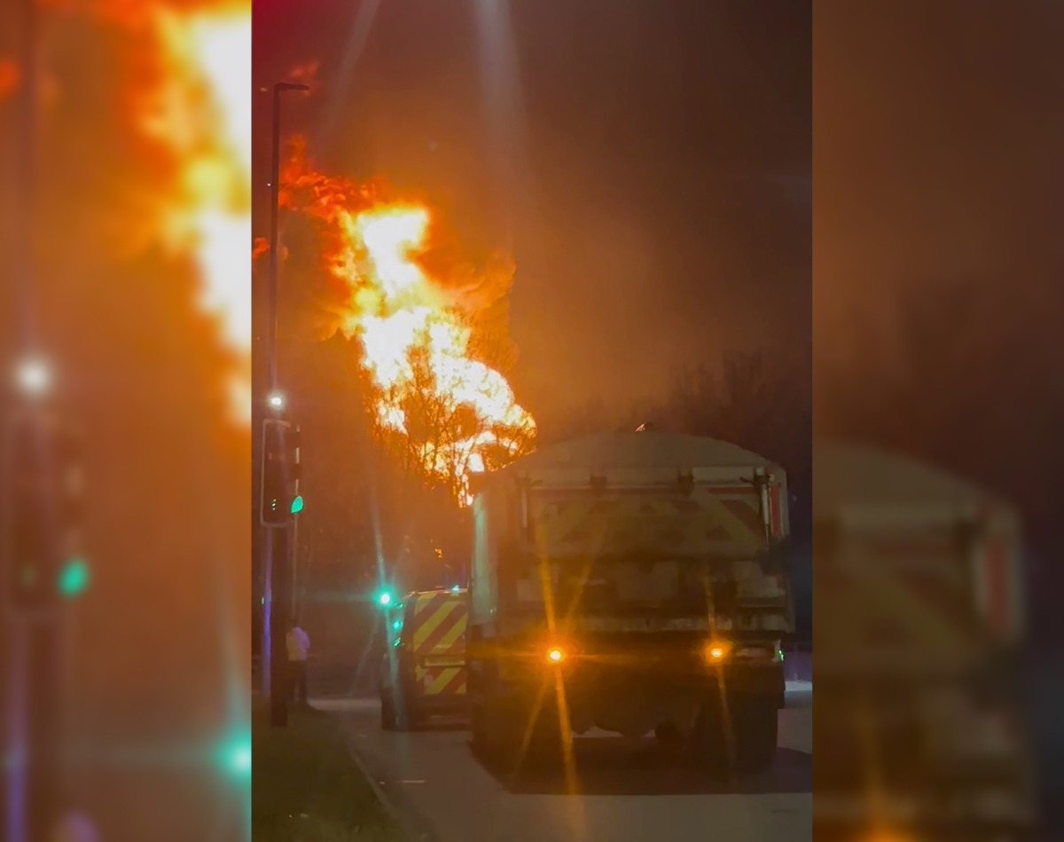 This frame grab taken from a UGC video shot and posted on X on March 21, 2025 by @fire_at_Vill shows a fire burning at a neighborhood electrical substation supplying power to Heathrow Airport in Hayes, west London. Photo by Handout / Courtesy of X user @fire_at_Vill / AFP