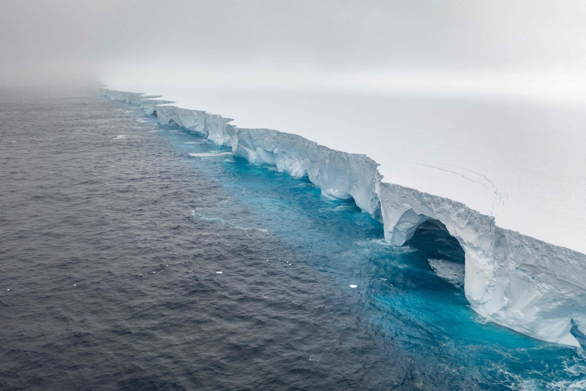 This handout image released by EYOS Expeditions on January 19, 2024, shows an aerial view of the A23a iceberg in the waters of The Southern Ocean off Antarctica on January 14. Photo by IAN STRACHAN / EYOS Expeditions / AFP

