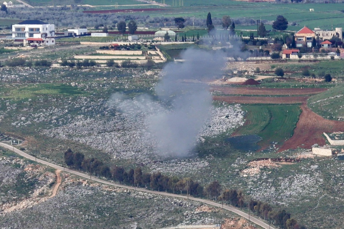 Smoke billows from the site of Israeli artillery shelling that targeted the area of the southern Lebanese village of Yohmor on March 22, 2025. (Photo by Rabih DAHER / AFP)
