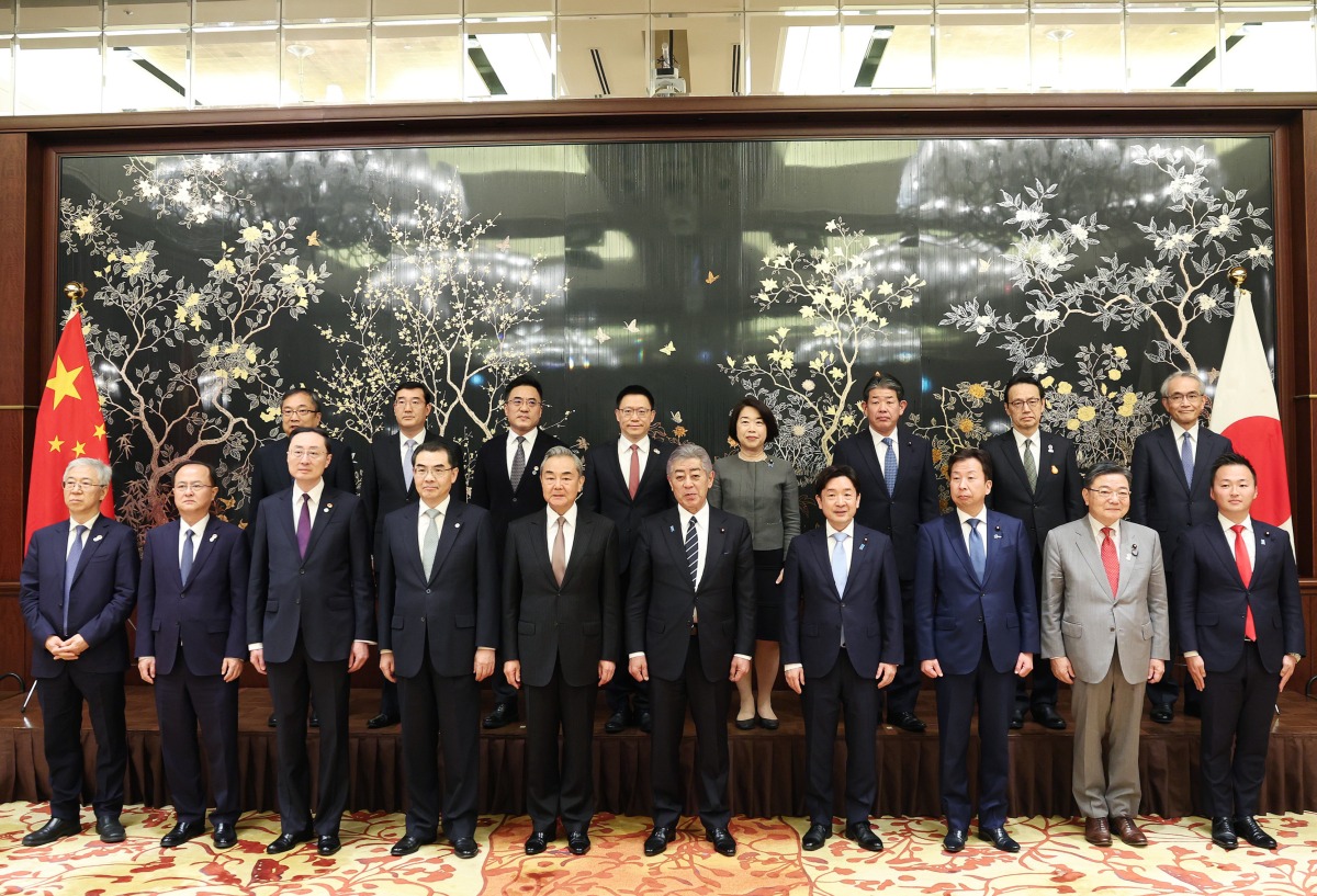 Chinese Foreign Minister Wang Yi, also a member of the Political Bureau of the Communist Party of China Central Committee, co-chairs the sixth China-Japan High-Level Economic Dialogue with Japanese Foreign Minister Takeshi Iwaya in Tokyo, Japan, March 22, 2025. (Xinhua/Jia Haocheng)
