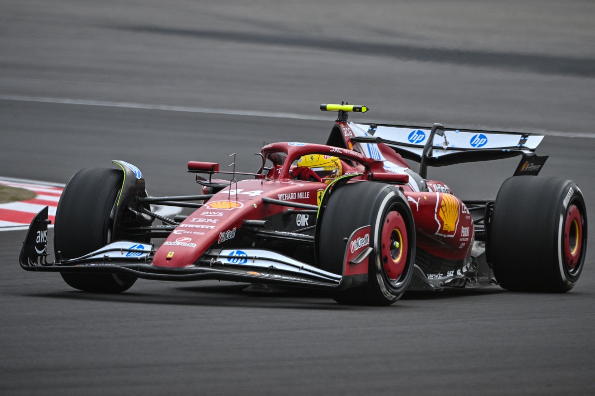 Ferrari's British driver Lewis Hamilton drives during the Formula One Chinese Grand Prix at the Shanghai International Circuit in Shanghai on March 23, 2025. Photo by Hector RETAMAL / AFP.
