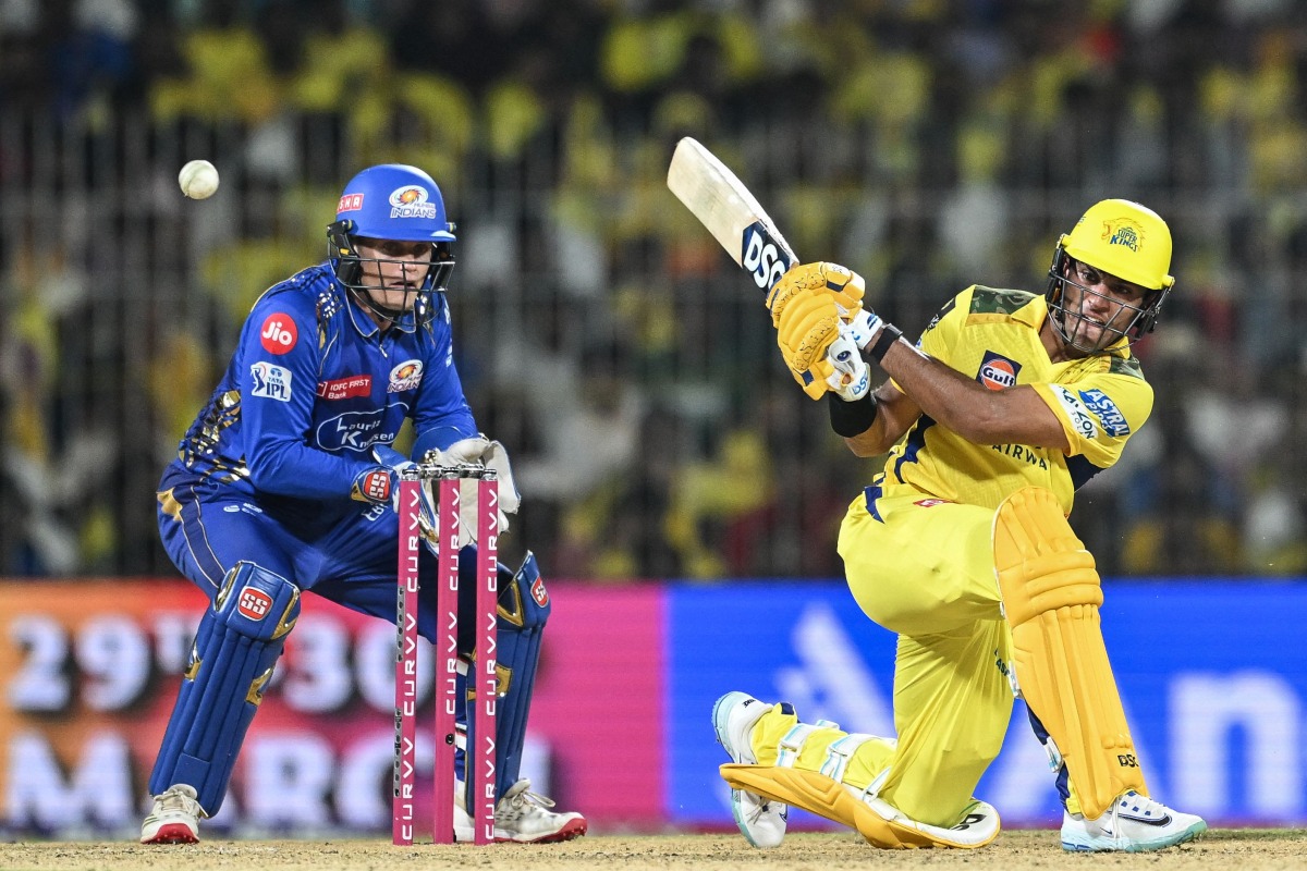 Chennai Super Kings' Rachin Ravindra (R) plays a shot during the Indian Premier League (IPL) Twenty20 cricket match between Chennai Super Kings and Mumbai Indians at the MA Chidambaram Stadium in Chennai on March 23, 2025. (Photo by R.Satish BABU / AFP)